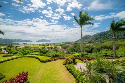 a view of a park with a palm tree at Altavista 2C 3 bdr 3 bath Ocean View in La Mona