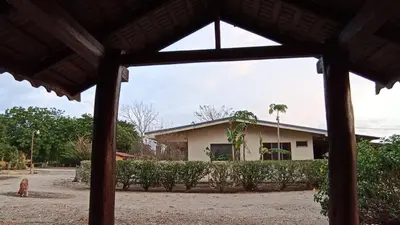 a view of a building from a porch at Hotel El Paraje in Santa Cruz