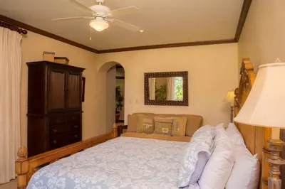 a bedroom with a bed and a ceiling fan at Bay Residence 7C - 3 bdr 2 bath in La Mona
