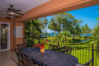 a dining room table with a view of the ocean at Bay Residence 7C - 3 bdr 2 bath in La Mona