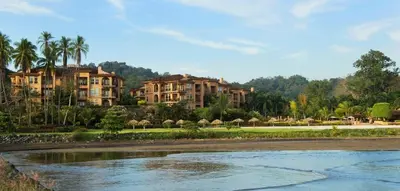 a large house next to a body of water at Bella Vista 3F- 3 bdr 3 1 and a half Bath Family in La Mona