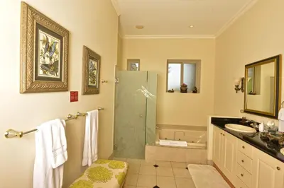 a bathroom with a shower and a sink at Bella Vista 4B - 3 bdr -3 1 and a half bath Ocean View in La Mona