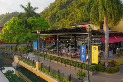 a restaurant on the side of a river at Casa Patron 6 bdr Private pool in La Mona