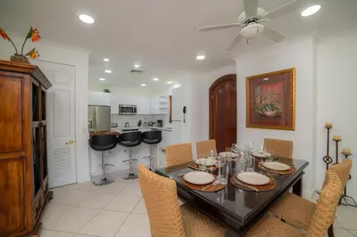 a dining room with a table and chairs at Colina 5D - 3 bdr 2 bath Family in La Mona