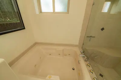 a bathroom with a bath tub and a shower at Bella Vista 3A 3BR Ocean View in La Mona
