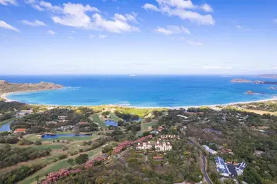 an aerial view of a beach and the ocean at Luxury Condo at Reserva Conchal with Incredible Ocean Views and Exclusive Beach Club Access in Brasilito