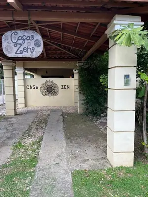 a building with a sign on the side of it at Casa Zen in Potrero