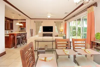 a living room with a dining room and a living room at Vista Bahia 1G - 3bed 3 bath Ocean View in Herradura