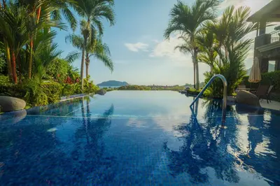 a swimming pool with a water slide in a resort at Vista Bahia 3D - 3bdr 3bath plunge pool in Herradura