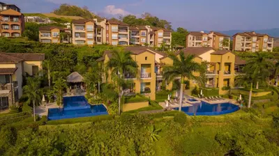 an aerial view of a resort with condos at Vista Bahia 3F 1 bedr 1 1 and a half bath ocean view in Herradura