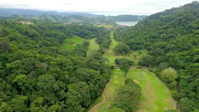 an overhead view of a golf course in a forest at Veranda 5H - 1 Bedr 1 Bath in La Mona