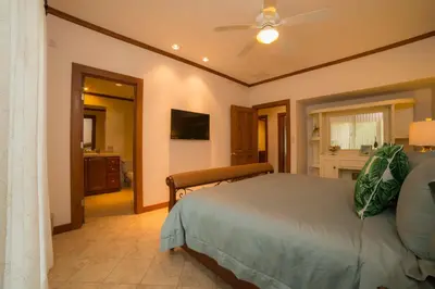 a bedroom with a bed and a bathroom at Veranda 8F - 2 bdr 2 bath - Condo in La Mona