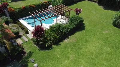 an overhead view of a swimming pool in a yard at 2 Tiny Houses Private Pool Volcano View 6 people in Fortuna