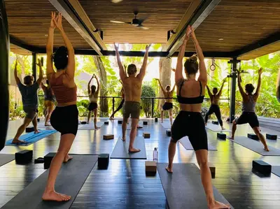 a group of people in a yoga class at Ohana Villa - Ocean View and a Walk to the Beach in Nosara