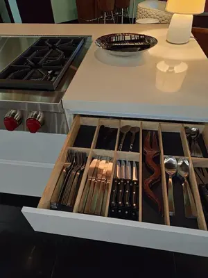 a drawer in a kitchen with utensils at Villa Jardin in Quepos