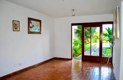 an empty room with a door to a patio at Habitación Sabana in San José