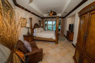 a living room with a bed and a couch at Marbella 3D 3 BR Ocean View in La Mona