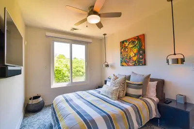 a bedroom with a bed and a window at Miramar 5B Family 3 bedr 3 bath in La Mona