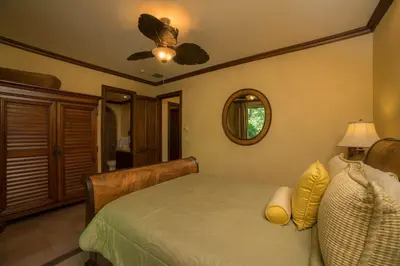 a bedroom with a bed and a ceiling fan at Montebello 1C - 3 bdr 3 bath Ocean view in La Mona
