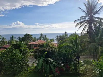 a view of the ocean from a resort at El Diamante - Colibri in Playa Hermosa