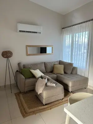 a living room with a couch and a table at Remote Work Haven 15 Minutes from the Beach in Sardinal