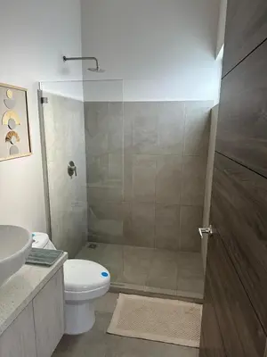 a bathroom with a shower with a toilet and a sink at Remote Work Haven 15 Minutes from the Beach in Sardinal