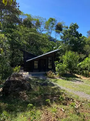 a small house in the middle of a field at Pipe's Cabin in San Pablo