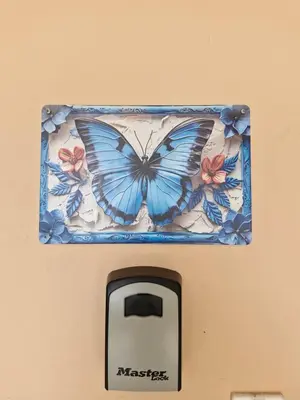 a picture of a butterfly on top of a remote control at El Diamante - Playa Hermosa in Playa Hermosa