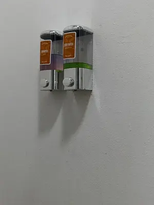 a couple of paper towels on a wall at Pupa House Hotel in Tamarindo