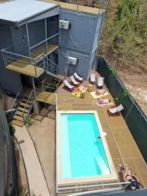 an overhead view of a swimming pool on a house at Pupa House Hotel in Tamarindo