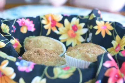 a bunch of muffins in a box with flowers at TreeTops Inn in San Juanillo