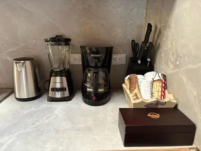a kitchen counter with a blender and a box at Dreams of Golden Wings in Monteverde Costa Rica