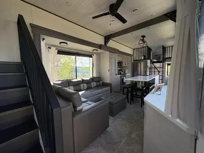 a living room with a couch and a table at Villa Sura in Colón