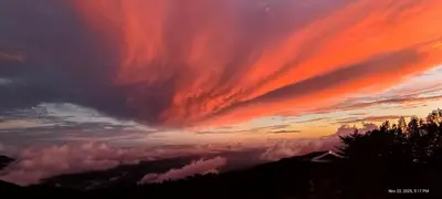 a view of a cloudy sky at sunset at Infinite Stillness Farm in Buenos Aires