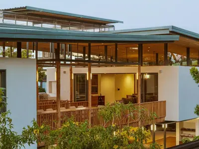 an image of a house with large windows at Nimbu Vida in Tamarindo