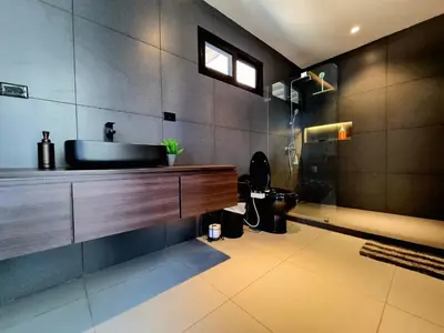 a bathroom with a sink and a shower at Playa Potrero in Potrero