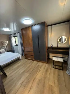 a bedroom with a bed and a mirror and a desk at Casa Mosquero - lovely 1 bedroom home in Tamarindo - private and serene in Tamarindo