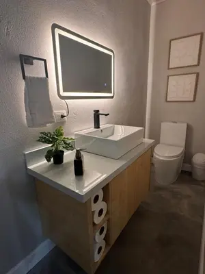 a bathroom with a sink and a toilet at Blue Zone Private Eco Residence - Essence Suite - in Tamarindo