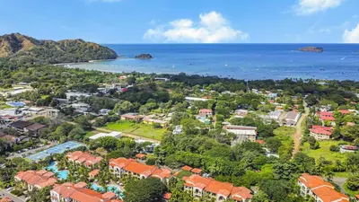 an aerial view of a resort near the ocean at Brisa Mar, Ocean Views, Beach Club & Pools in Sardinal