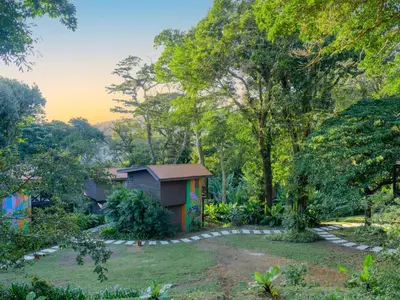 a house in the middle of a garden at Nido de Montaña in Fraijanes