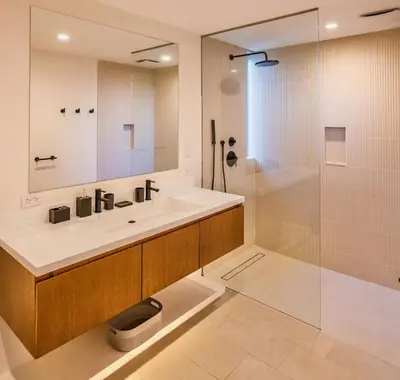 a bathroom with a sink and a shower at Nimbu East in Tamarindo