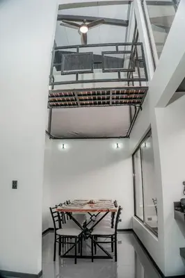 a dining room with a table and two chairs at Villa Vet Stylish 3BR Home - New Build - Perfect for families in Fortuna