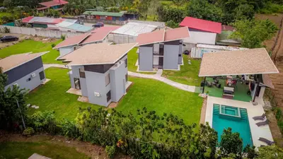 an aerial view of a house with a yard at Villa Sunset Relaxing 2BR Villa with Outdoor Hot Tub in Fortuna