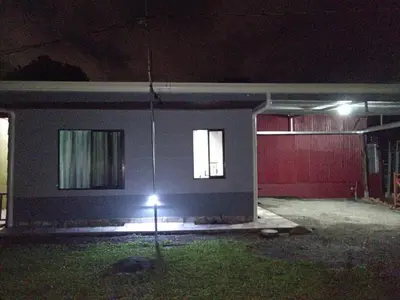 a house at night with a light in the yard at Yamis home in General Viejo