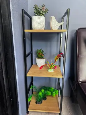 a shelf with potted plants on top of it at newly remodeled apartment , jaco herradura ,2 cuartos in Herradura