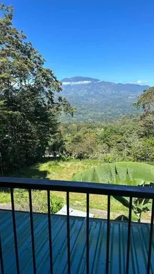 a view from the balcony of a house at Villa Solevila in Turrialba