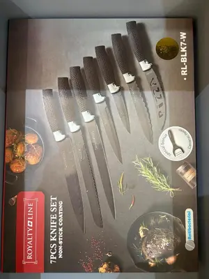 a magazine with different types of knives on it at House equipped with a Jacuzzi in Quepos in Quepos