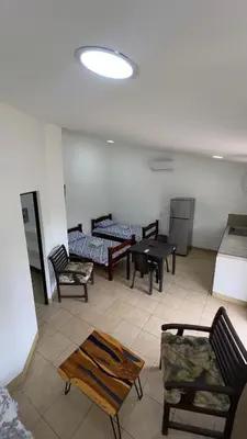 a living room with couches and tables in a room at Casa Antioquia #5 in Garita