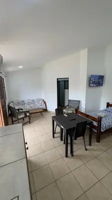 a room with a table and chairs and a bed at Casa Antioquia #5 in Garita