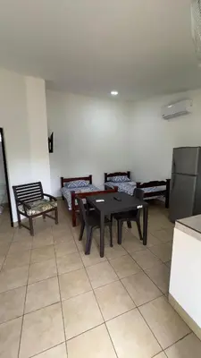 a room with a table and chairs and a couch at Casa Antioquia #5 in Garita